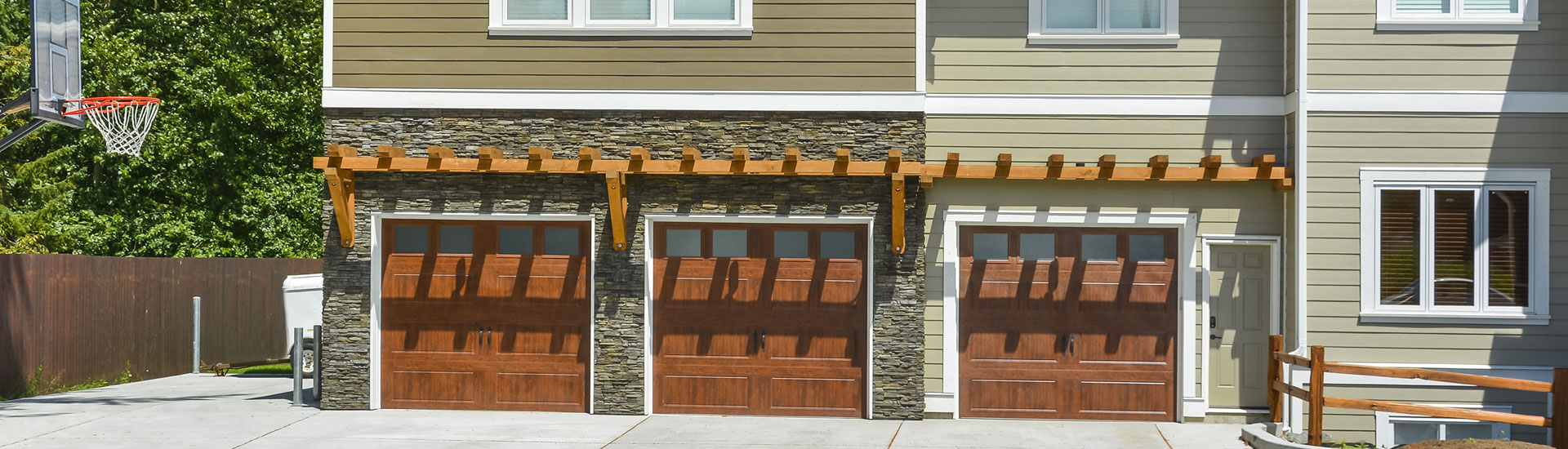 Three Wooden Garage Doors